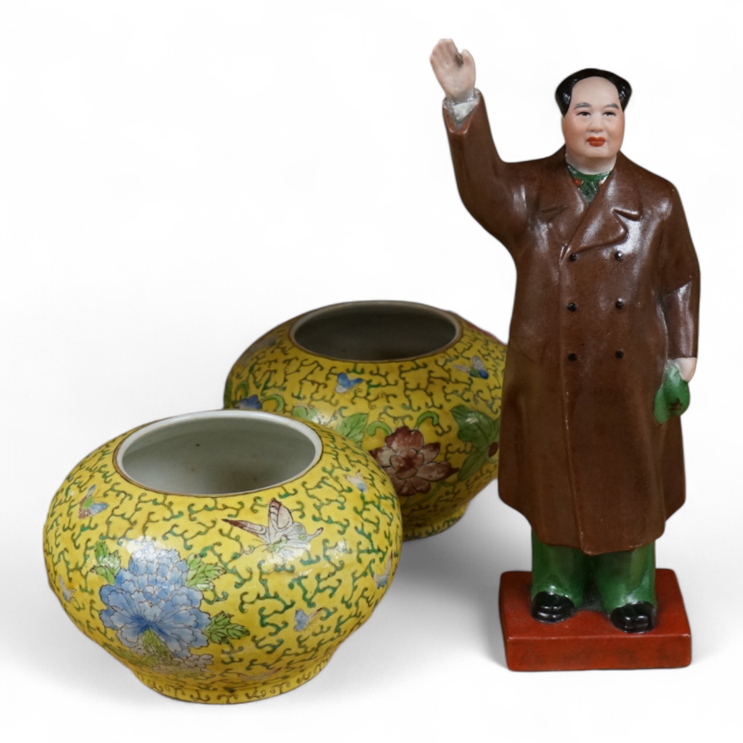 A Chairman Mao porcelain figure and a pair of Chinese yellow ground bowls decorated with flowers and insects, largest 30cm high